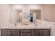 Double vanity bathroom with modern finishes and a spacious layout at 1714 Wynford Cir, Tavares, FL 32778