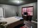 Main bedroom with large bed, ample closet space and TV at 1149 Holden Ave, Orlando, FL 32839