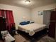 Bedroom with king-size bed and neutral color scheme at 1149 Holden Ave, Orlando, FL 32839