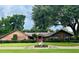 Brick ranch house with mature landscaping at 3336 Edgecliffe Dr, Orlando, FL 32806