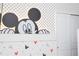 Accent wall with Mickey Mouse design and polka dots at 7944 Formosa Valley Pl, Kissimmee, FL 34747