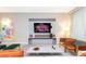 Living room with large TV and comfortable seating at 7944 Formosa Valley Pl, Kissimmee, FL 34747