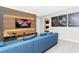 Home theater with sectional sofa and Star Wars decor at 7944 Formosa Valley Pl, Kissimmee, FL 34747
