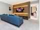 Theater room showcasing a large screen TV and comfortable seating at 7944 Formosa Valley Pl, Kissimmee, FL 34747