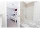 Clean bathroom with tub and view of Mickey Mouse bedroom at 7944 Formosa Valley Pl, Kissimmee, FL 34747