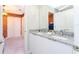 Double vanity with granite countertop at 7944 Formosa Valley Pl, Kissimmee, FL 34747