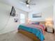Spacious bedroom featuring a comfortable bed and calming decor at 1526 White Hawk Way, Groveland, FL 34736