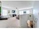 Spacious bonus room with sectional sofa and fireplace at 1526 White Hawk Way, Groveland, FL 34736