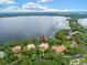 Luxury home on the lake with lush landscaping and beautiful water views at 9164 Point Cypress Dr, Orlando, FL 32836
