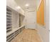 Convenient mudroom with built-in storage and bench at 9164 Point Cypress Dr, Orlando, FL 32836