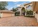 Brick driveway and two-car garage at 9164 Point Cypress Dr, Orlando, FL 32836