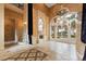 Elegant living room with fireplace and water views at 9164 Point Cypress Dr, Orlando, FL 32836