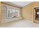 Charming bedroom with window seat and built-in shelves at 9164 Point Cypress Dr, Orlando, FL 32836