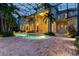 Resort-style pool and spa with brick pavers and lush landscaping at 9164 Point Cypress Dr, Orlando, FL 32836