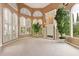 Spacious Gathering room with high ceilings and large windows at 9164 Point Cypress Dr, Orlando, FL 32836