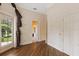 Bedroom with hardwood floors and access to bathroom at 9164 Point Cypress Dr, Orlando, FL 32836