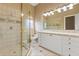 Bathroom with large shower and double vanity at 9164 Point Cypress Dr, Orlando, FL 32836