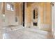 Grand living room with fireplace and built-in shelves at 9164 Point Cypress Dr, Orlando, FL 32836