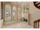 Sitting room with fireplace and built-in window seat at 9164 Point Cypress Dr, Orlando, FL 32836