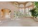 Gathering room with pool and water views at 9164 Point Cypress Dr, Orlando, FL 32836