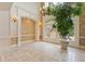 Spacious living room with large windows and high ceilings at 9164 Point Cypress Dr, Orlando, FL 32836