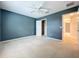 Bedroom with ceiling fan and neutral wall color at 9939 Marsh Pointe Dr, Orlando, FL 32832