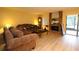 Living room with fireplace and wood flooring at 8 Escondido Cir # 79, Altamonte Springs, FL 32701