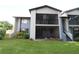Two-story condo building with screened balcony at 8 Escondido Cir # 79, Altamonte Springs, FL 32701