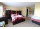 Main bedroom with a large bed and ensuite bathroom at 8 Escondido Cir # 79, Altamonte Springs, FL 32701