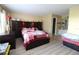 Main bedroom with a large bed and ensuite bathroom at 8 Escondido Cir # 79, Altamonte Springs, FL 32701
