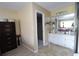 Bathroom with a vanity and shower access from the bedroom at 8 Escondido Cir # 79, Altamonte Springs, FL 32701