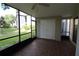 Spacious screened patio with tile flooring and storage closet at 8 Escondido Cir # 79, Altamonte Springs, FL 32701