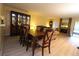 Bright dining room with wood flooring and furniture at 8 Escondido Cir # 79, Altamonte Springs, FL 32701
