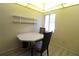 Small dining area with table and chairs at 8 Escondido Cir # 79, Altamonte Springs, FL 32701