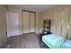 Bright bedroom with hardwood floors and large closet at 8 Escondido Cir # 79, Altamonte Springs, FL 32701