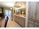 Wood buffet and mirror in dining area at 8 Escondido Cir # 79, Altamonte Springs, FL 32701