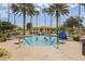 Resort-style pool with palm trees and ample seating at 217 Anastasia Dr, Kissimmee, FL 34759
