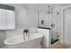 Elegant bathroom with a freestanding tub and a walk-in shower at 1020 Wisconsin Ave, St Cloud, FL 34769