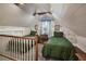 Upstairs bedroom with two twin beds and sloped ceilings at 1020 Wisconsin Ave, St Cloud, FL 34769