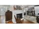 Living room featuring a fireplace and hardwood floors at 1020 Wisconsin Ave, St Cloud, FL 34769