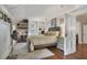 Spacious bedroom with built-in shelves and hardwood floors at 1020 Wisconsin Ave, St Cloud, FL 34769