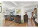 Spacious living area with hardwood floors and a fireplace at 1020 Wisconsin Ave, St Cloud, FL 34769