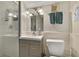 Clean bathroom with a gray vanity and shower/tub combo at 1020 Wisconsin Ave, St Cloud, FL 34769