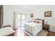 Relaxing bedroom with king-size bed and private balcony access at 9055 Treasure Trove Ln # 206, Kissimmee, FL 34747