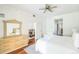 Comfortable bedroom with king-size bed and views into the dining room at 9055 Treasure Trove Ln # 206, Kissimmee, FL 34747