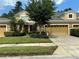Two story townhome with double garage and neatly landscaped yard at 452 Harbor Winds Ct, Winter Springs, FL 32708
