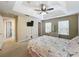Main bedroom with queen bed, ensuite access, and ample closet space at 452 Harbor Winds Ct, Winter Springs, FL 32708
