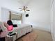 Comfortable bedroom with a queen-size bed and a TV at 452 Harbor Winds Ct, Winter Springs, FL 32708