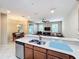 Kitchen with a breakfast bar overlooking the living room at 452 Harbor Winds Ct, Winter Springs, FL 32708