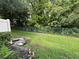 Private backyard with grassy area and fence at 452 Harbor Winds Ct, Winter Springs, FL 32708